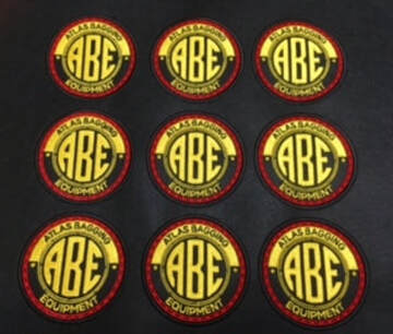 70mm patches for Atlas Bagging Equipment with black background