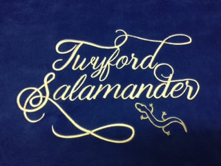 Twyford Salamander embroidered on rug